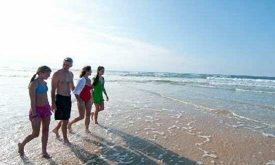 famiglia sulla spiaggia a Rimini