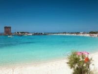 Porto Cesareo, spiaggia con la torre