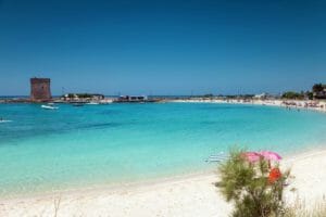 Porto Cesareo, spiaggia con la torre